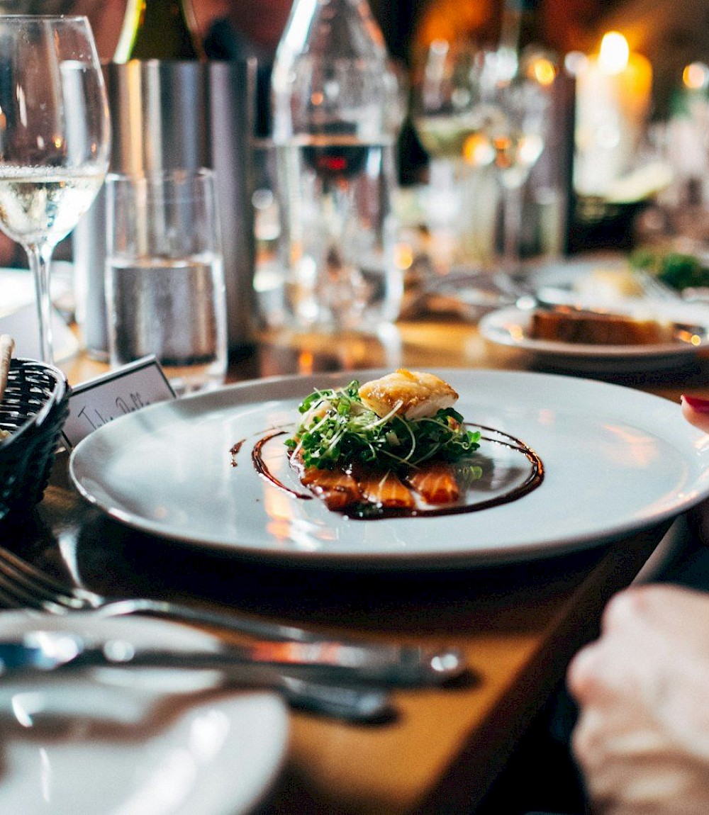 Elegant plated dinner served by Gourmet Grazing at an evening event